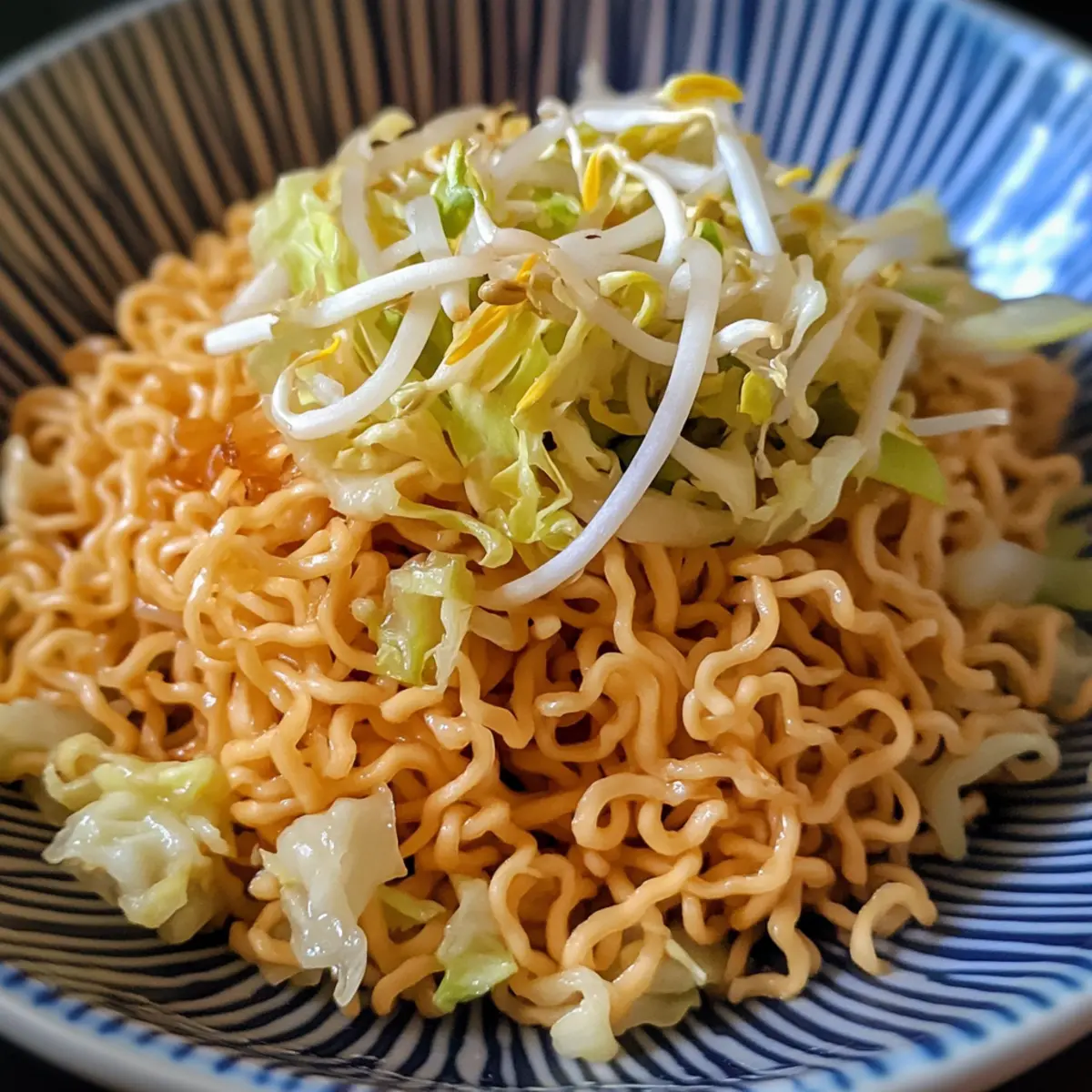 3.0 cups egg noodles cooked, 2.0 cups cabbage shredded, 1.0 cup bean sprouts, 1.0 tbsp soy sauce